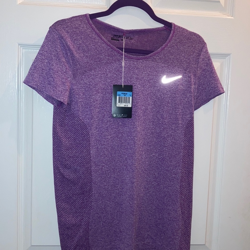 Women’s Nike dry fit golf T-shirt. Size medium